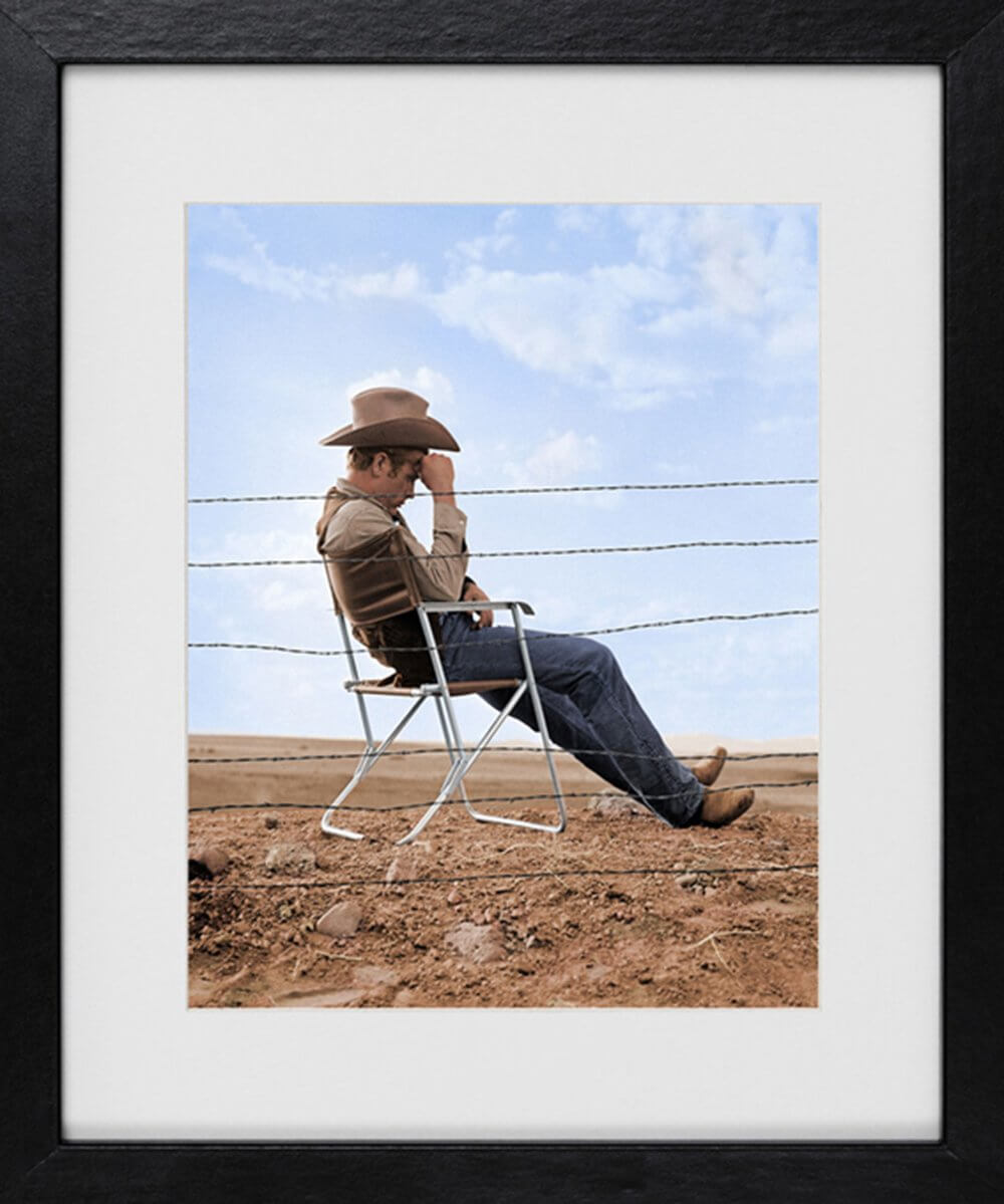 Frank Worth: James Dean Seated behind fence Set of Giant 1955 / color
